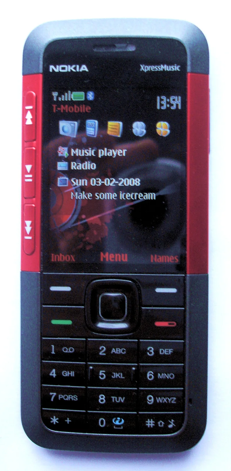 原版 Nokia 5310 XpressMusic 正面，保留来源的 T-Mobile 界面